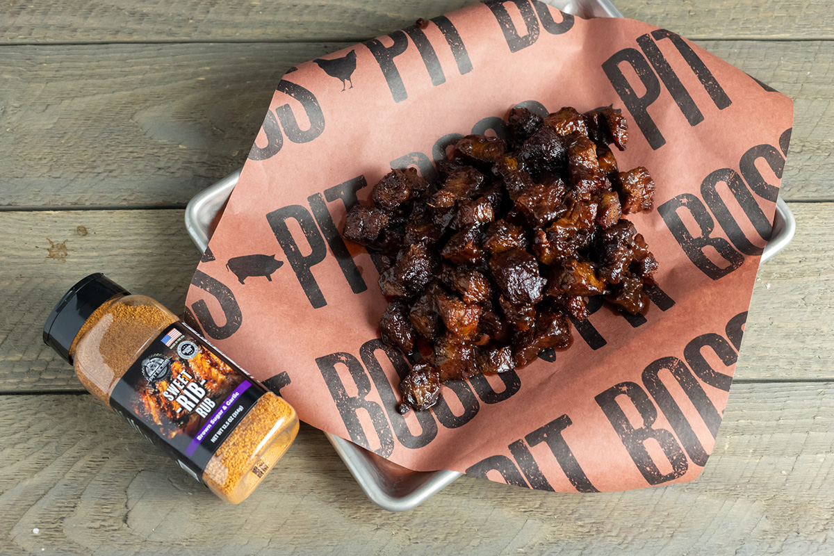 burnt ends on pit boss butcher paper next to pit boss sweet rib rub